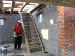 Строительство двухэтажного гаража (с мансардой) из блоков на плитном фундаменте